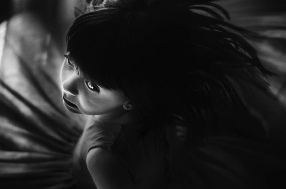 Child's Thoughtful Gaze by Desislava Ignatova — canvas wall art