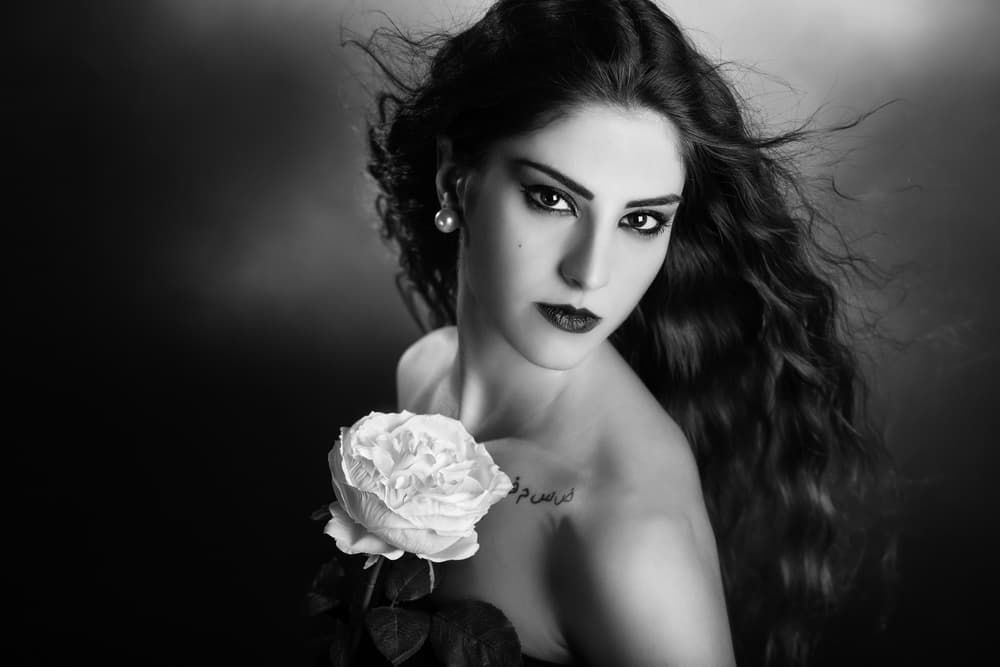 Elegant Woman With Rose by Peppe Tambè — canvas wall art