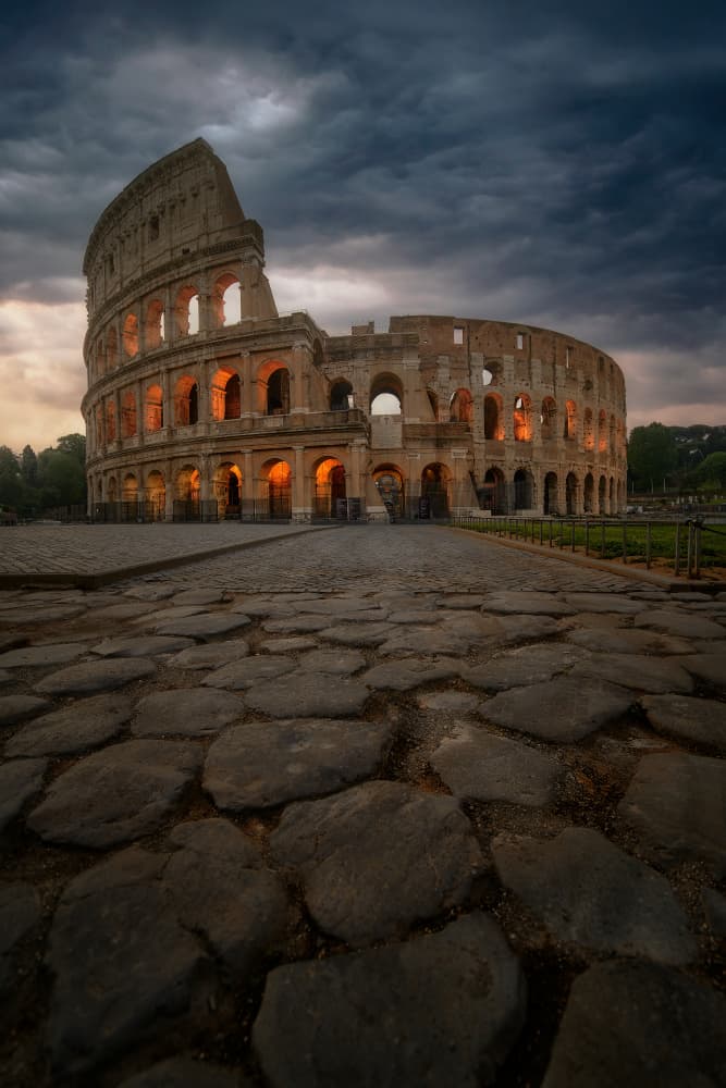 Illuminated Roman Colosseum by Bartolome Lopez — canvas wall art