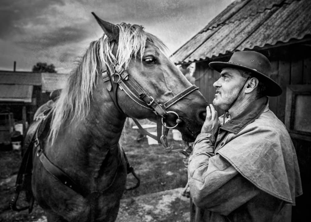 Man and Horse Bond by Robert Girmencea — canvas wall art