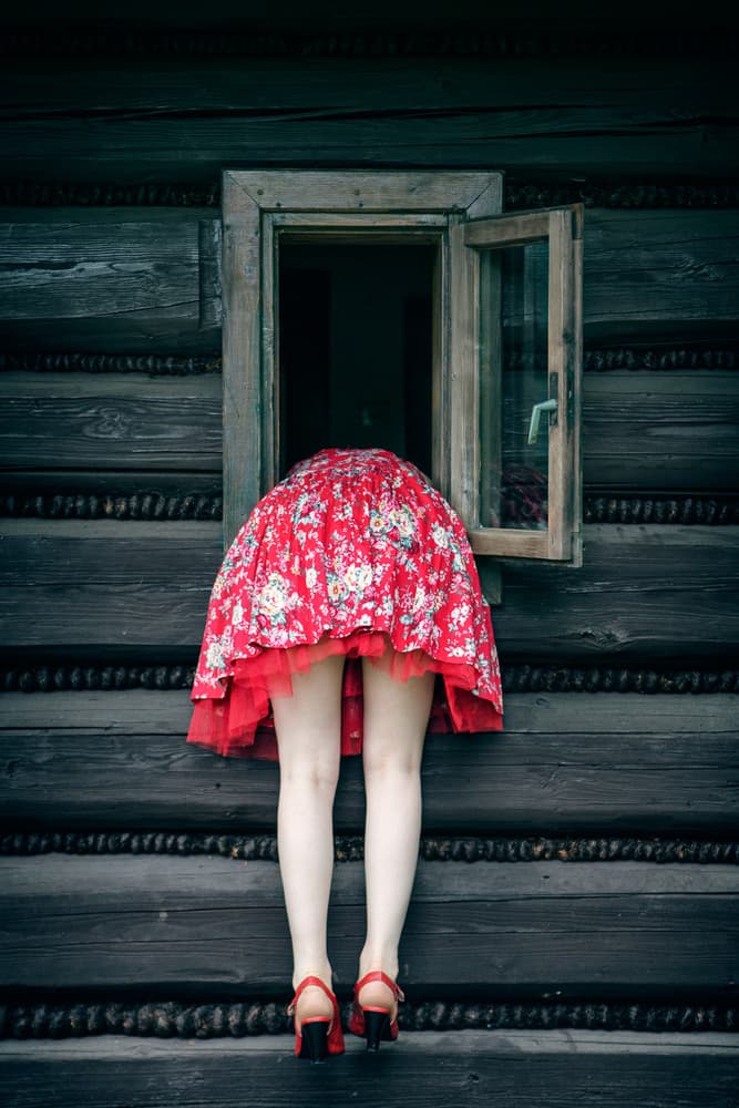 Red Dress Curiosity by Magdalena Russocka — canvas wall art