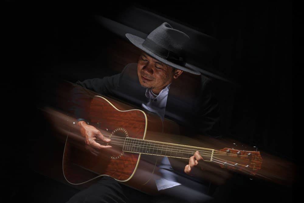 Soulful Guitarist by Ihsan M — canvas wall art