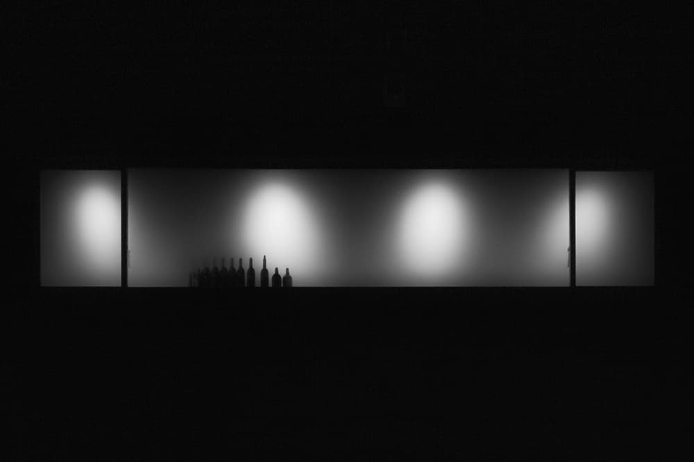 Bottle Silhouettes in Light by Filipe P Neto — canvas wall art