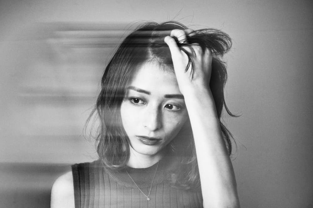 Woman In Deep Thought by Masatoshi Washimi — canvas wall art