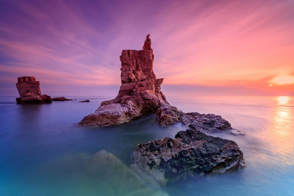 Vibrant Sea Stacks Sunset by Raimondo Restelli — canvas wall art
