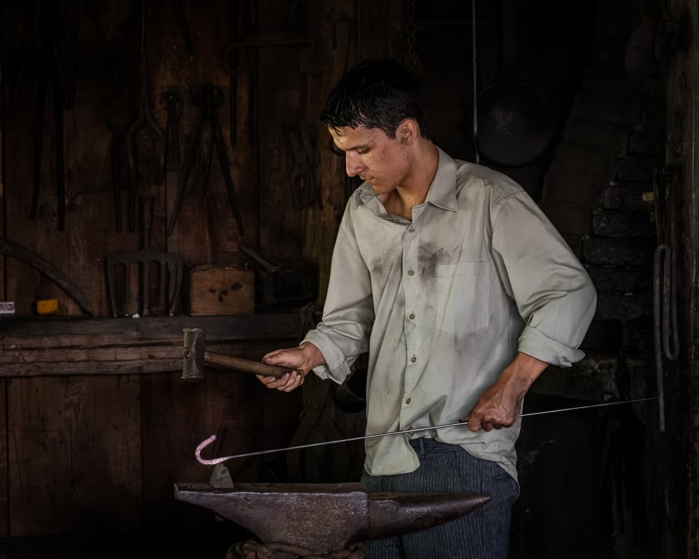 Blacksmith At Work by Miroslaw Prybinski — canvas wall art