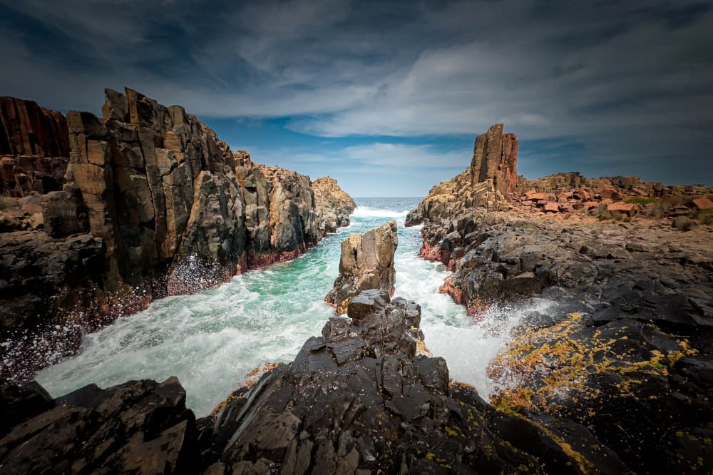 Dramatic Ocean Cliffs by Bing Li — canvas wall art