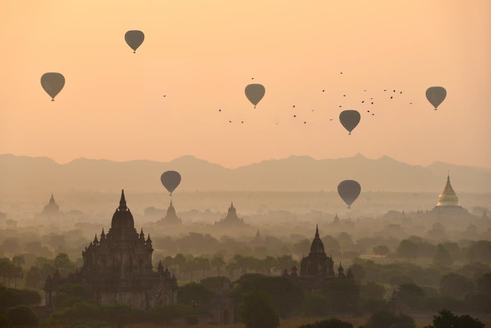 Balloons Over Ancient Temples by Sarawut Intarob — canvas wall art