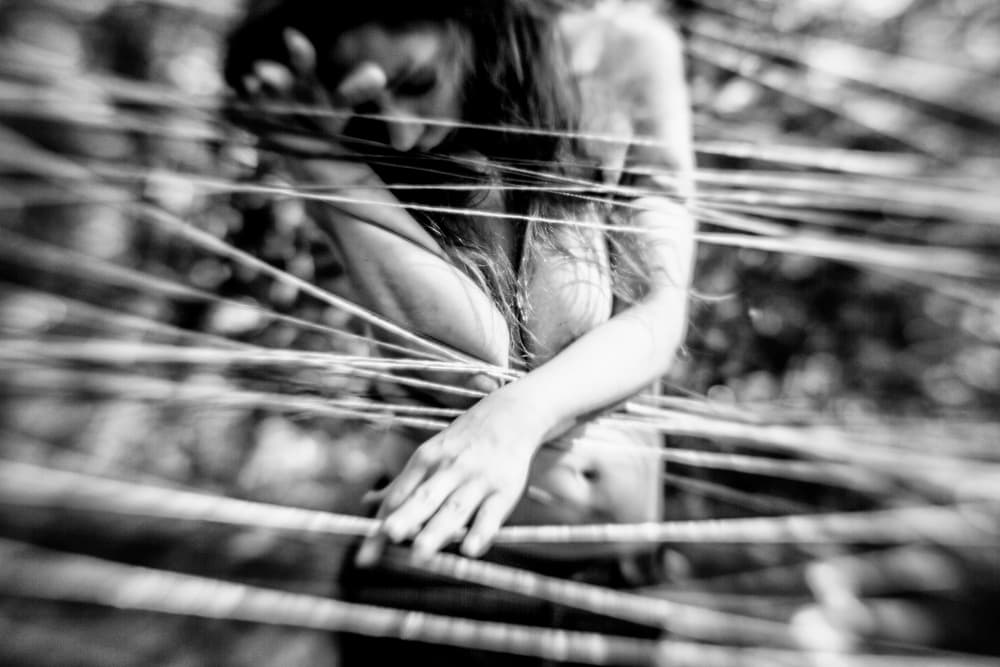 Woman Bound by Threads by Bogdan Bouşcă — canvas wall art