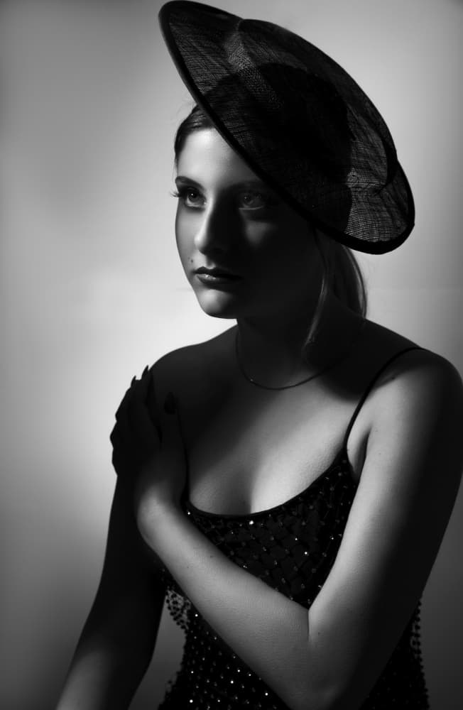 Mysterious Woman in Hat by Sharon Levy — canvas wall art