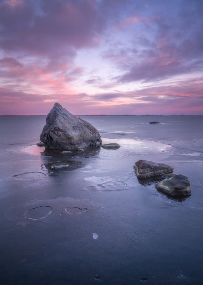 Frozen Rocks Sunset by Ludwig Riml — canvas wall art