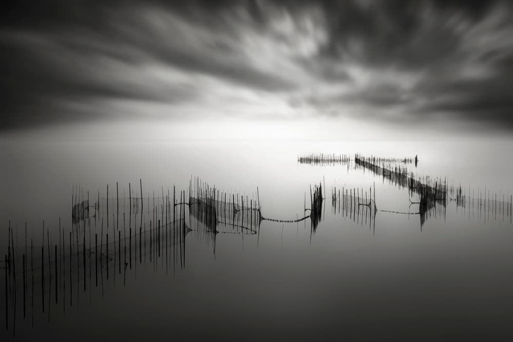 Moody Waters Fishing Nets by Joaquin Guerola — canvas wall art