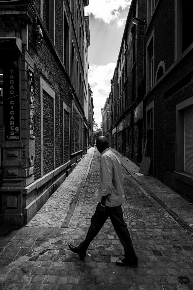 Man Walks City Alley by Andreas Timar — canvas wall art