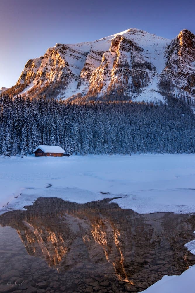 Snowy Mountain Cabin Reflection by Ariel Ling — canvas wall art