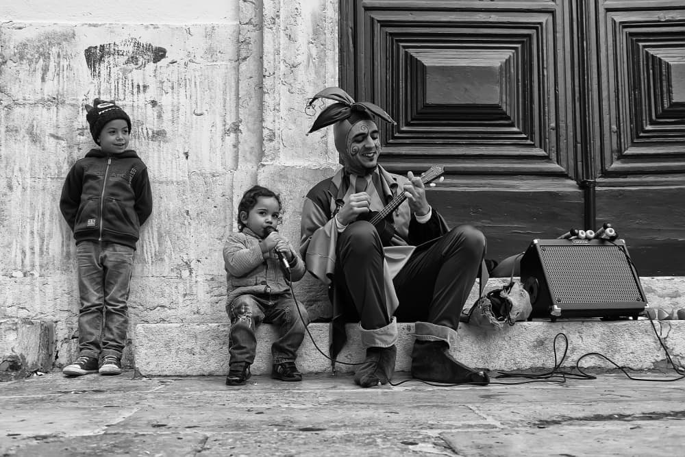 Happy Street Performance by Josefina Melo — canvas wall art