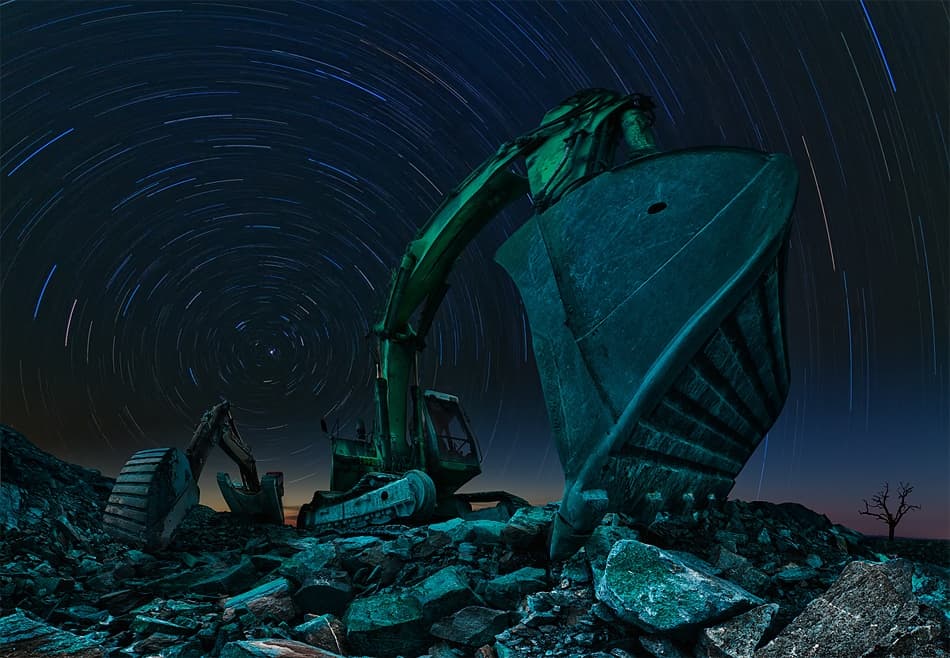 Excavator Under Star Trails by Peter Majkut — canvas wall art
