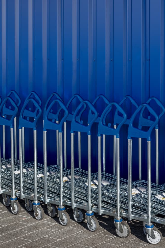 Ordered Blue Carts by Theo Luycx — canvas wall art