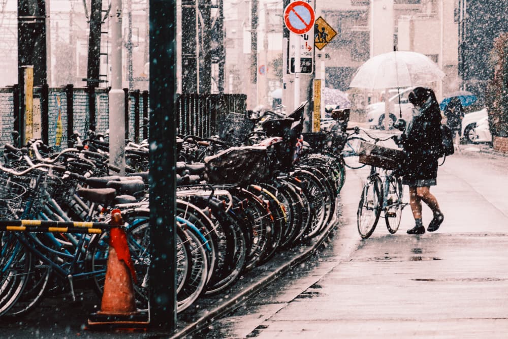 Snowy City Commute by HIDASAN — canvas wall art