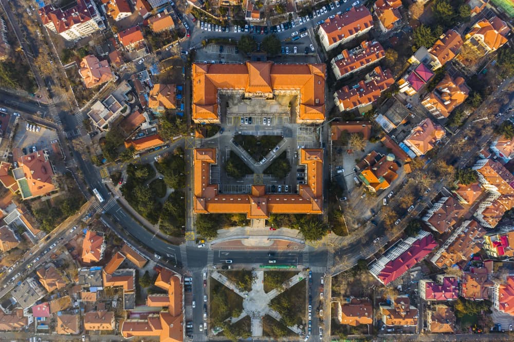 Red Roof City View by Xiaoyang Wang — canvas wall art