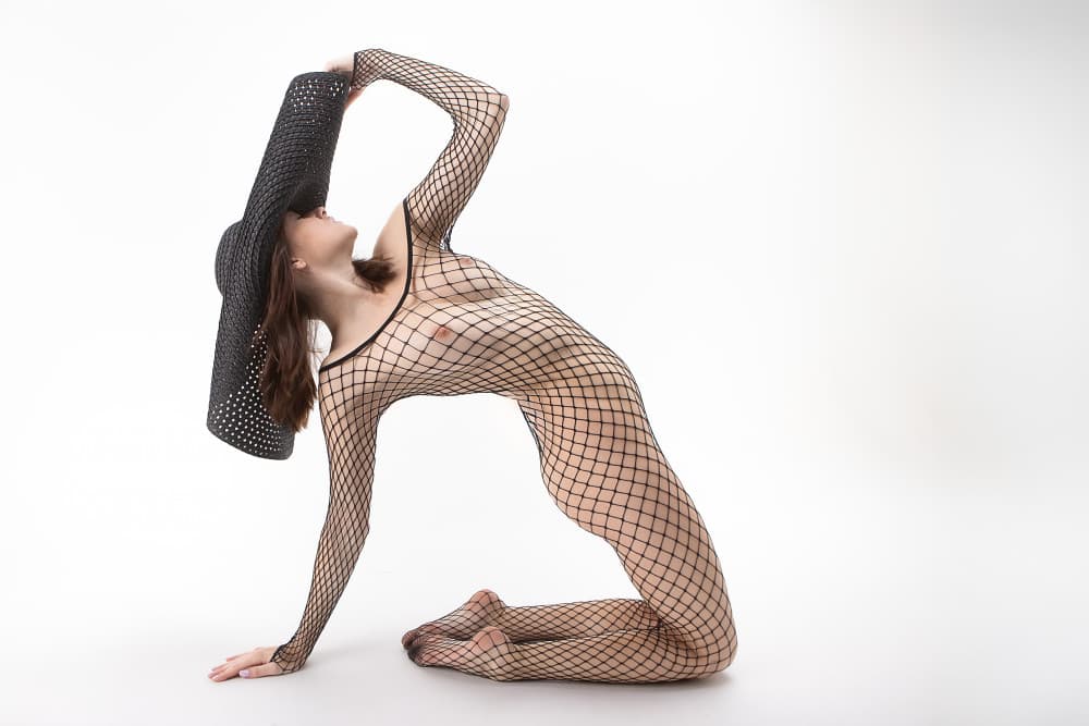 Sensual Fishnet Hat by Joan Gil Raga — canvas wall art