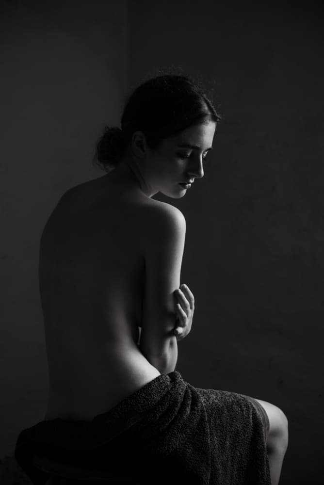 Shadowed Contemplation by Małgorzata Masarz — canvas wall art