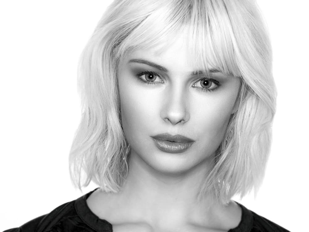 Elegant Blonde Beauty by Luc Stalmans — canvas wall art
