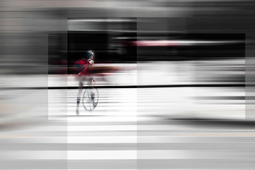 Red Cyclist Motion Blur by Carmine Chiriacò — canvas wall art