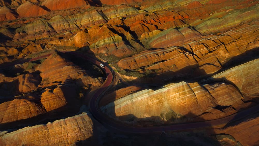 Winding Rainbow Mountain Road by FEI SHI — canvas wall art