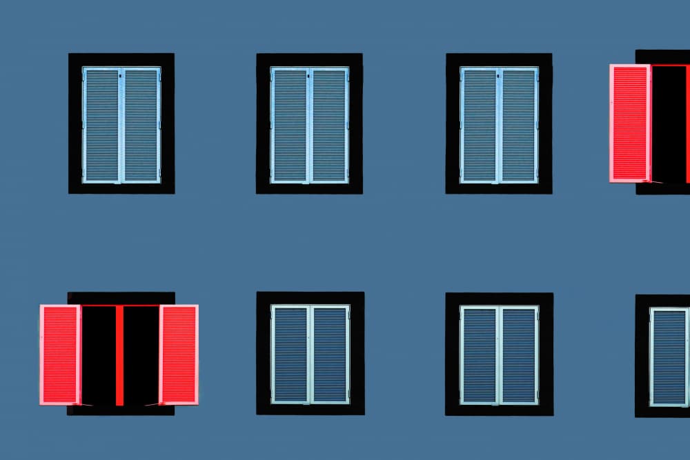 Red Shutters on Blue by Hans-Wolfgang Hawerkamp — canvas wall art