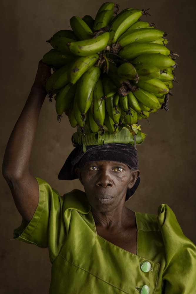 African Woman Carrying Bananas by Matt Jacob — canvas wall art