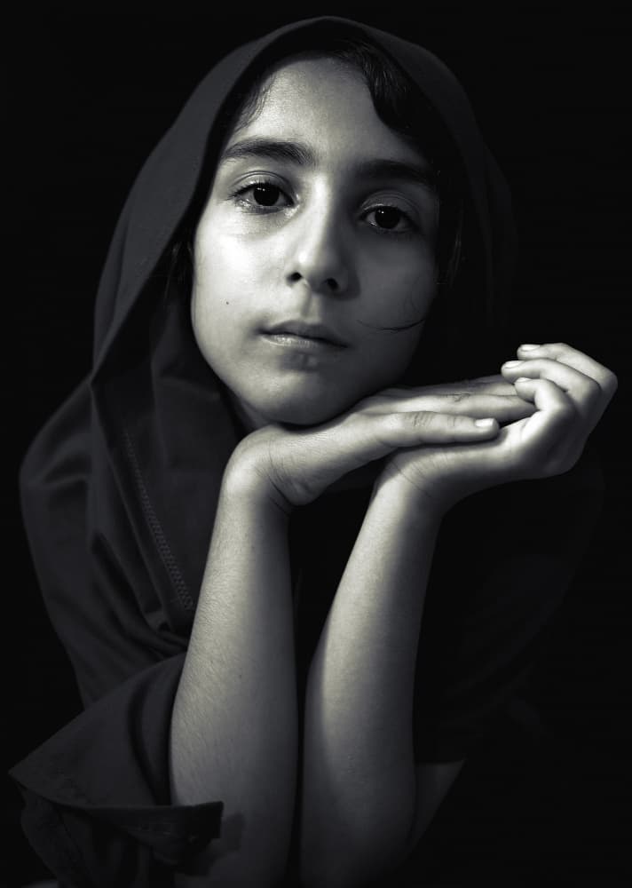 Serene Hooded Portrait by Hazem Swidan — canvas wall art