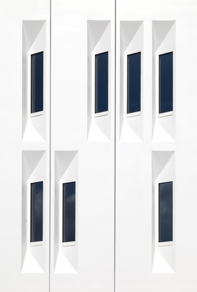 Geometric White Facade by Jeroen van de Wiel — canvas wall art