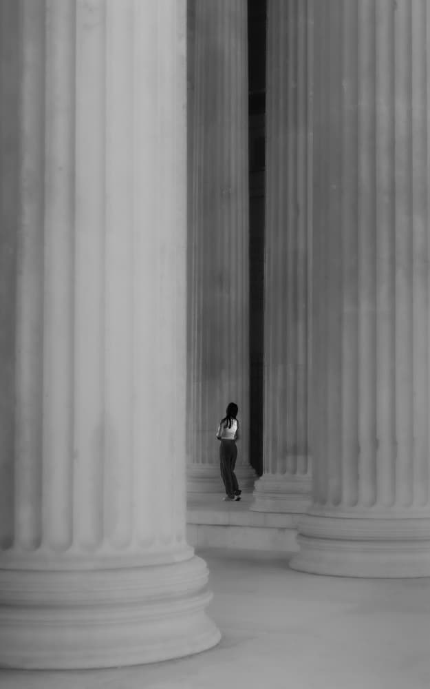 Woman Among Grand Columns by Andy Dauer — canvas wall art