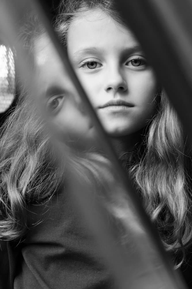 Girl's Reflective Gaze by Evelin Dobrev — canvas wall art