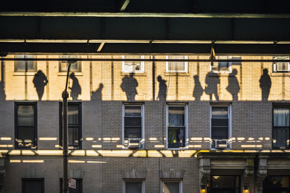 City Shadow Figures by Robert Sherman — canvas wall art
