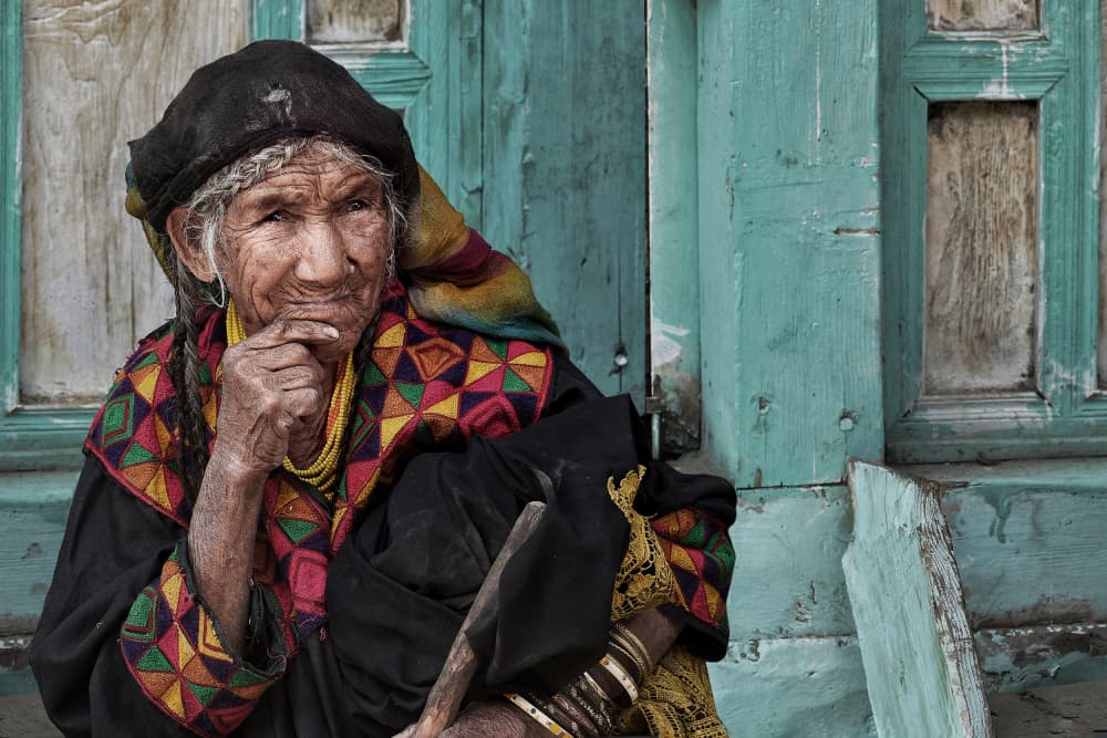 Contemplative Old Woman by Irene Perovich — canvas wall art