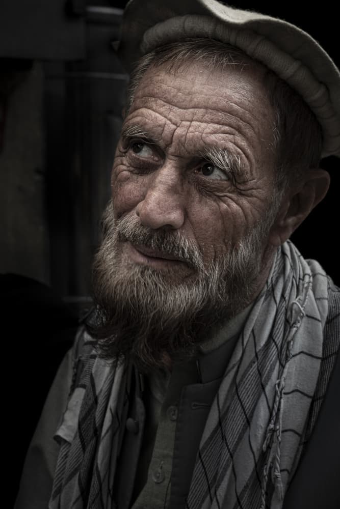 Thoughtful Elder Portrait by Elena Molina — canvas wall art