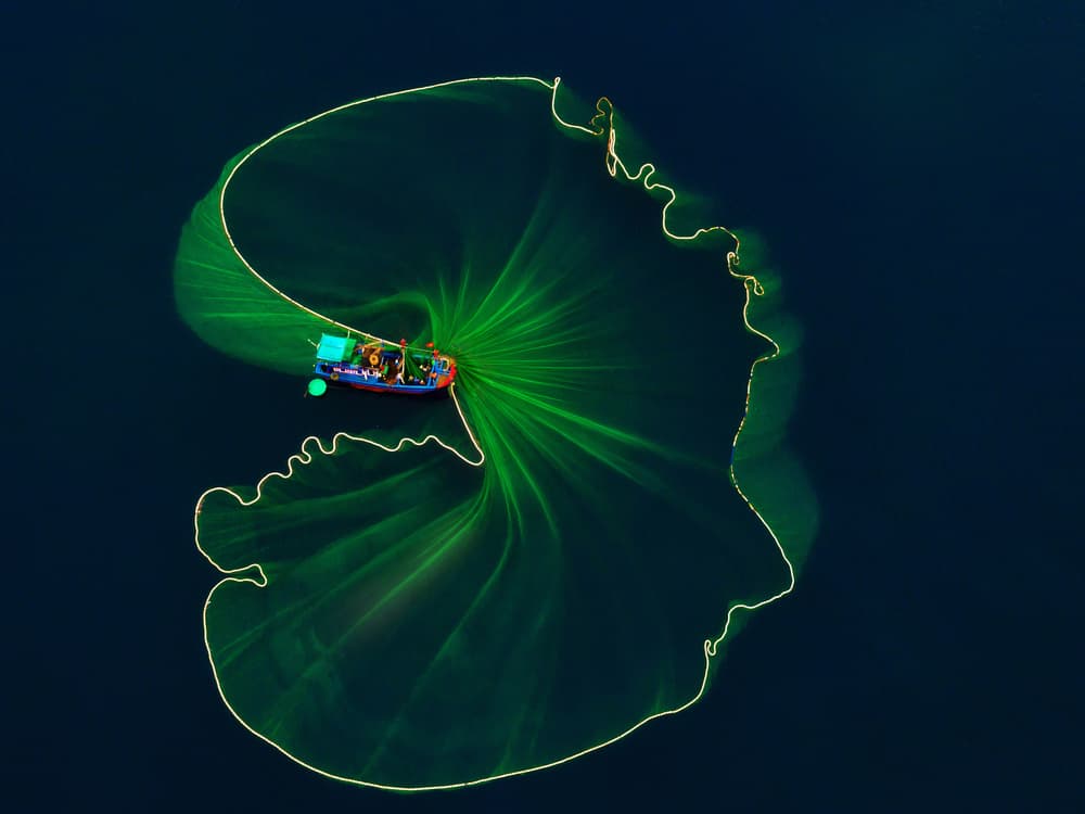 Glowing Fishing Net by Nguyen Tan Tuan — canvas wall art