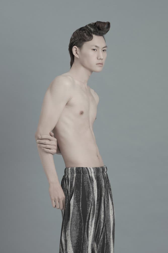 Man with Sculpted Hair by QYun — canvas wall art