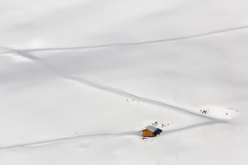 Isolated Winter Cabin by Uschi Hermann — canvas wall art