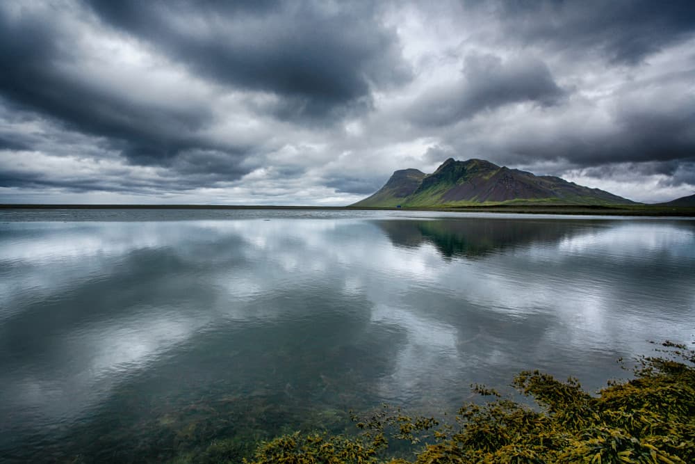 Moody Mountain Lake Reflection by Þorsteinn H. Ingibergsson — canvas wall art