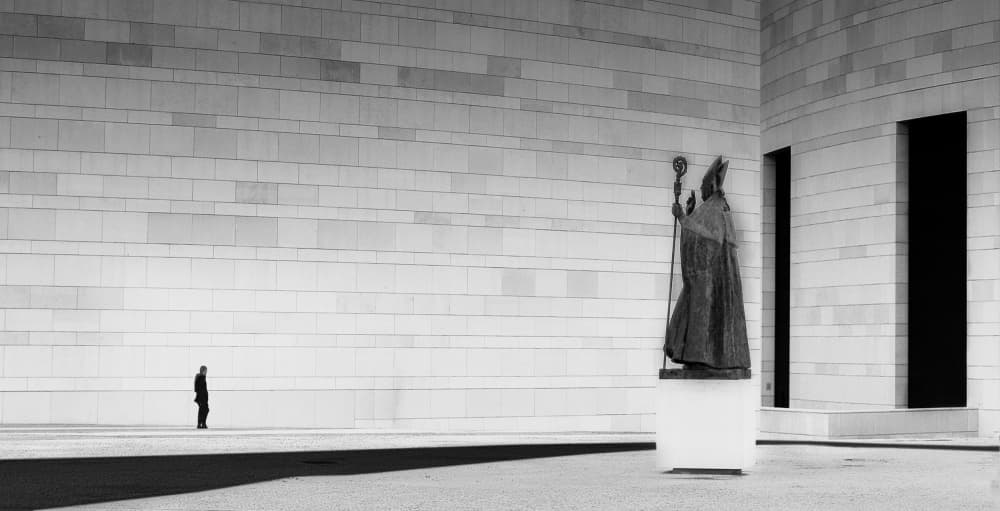 Lone Figure Bishop Statue by Olinda Coutinho — canvas wall art