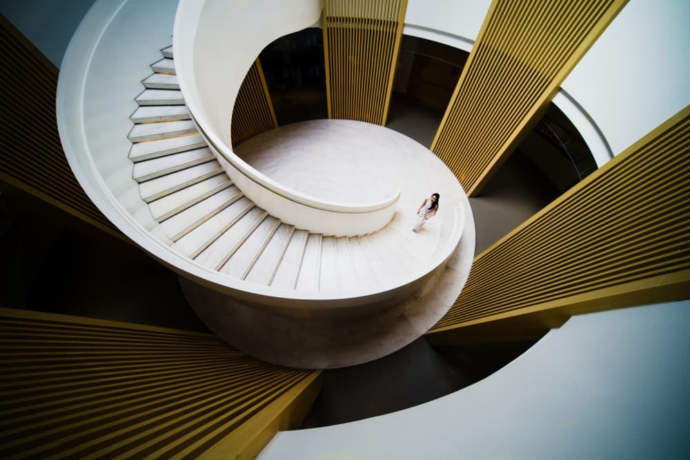 Woman on Spiral Staircase by konglingming — canvas wall art