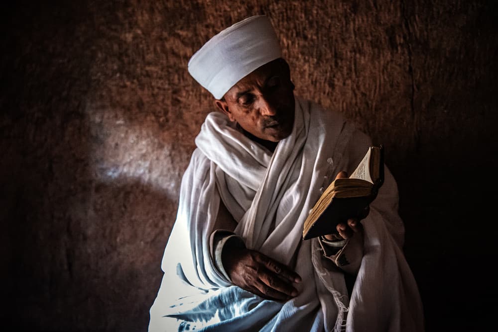 Man Reading Sacred Text by Linda Wride — canvas wall art
