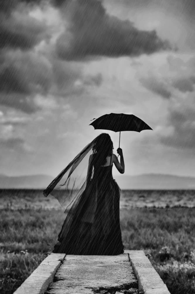 Woman Under Stormy Sky by Ummu Nisan Kandilcioglu — canvas wall art