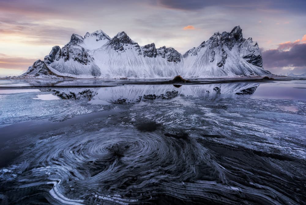 Icy Peaks Reflection by Jorge Ruiz Dueso — canvas wall art