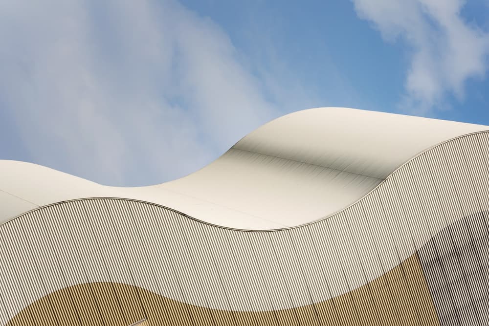 Wavy Building Sky by Henk van Maastricht — canvas wall art