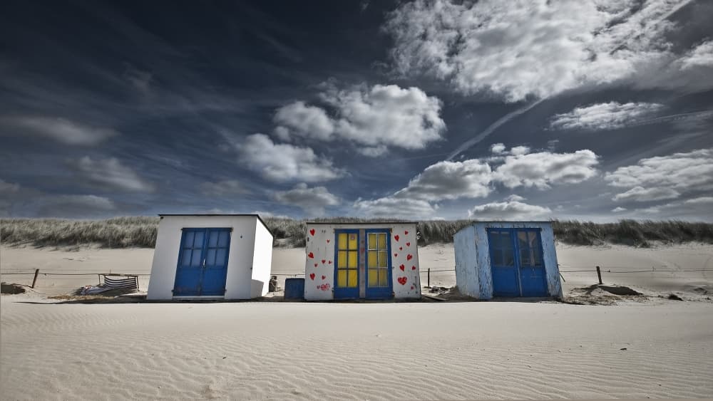 Colorful Beach Huts by Leon — canvas wall art