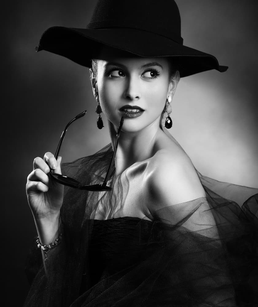 Elegant Woman Black Hat by Peppe Tambè — canvas wall art