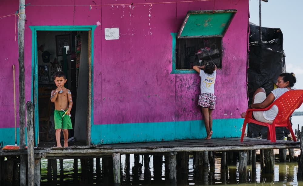 Colorful Stilt Home Life by Avital Hershkovitz — canvas wall art